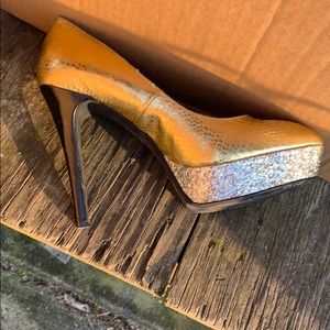 Bcbg gold and silver with black heel